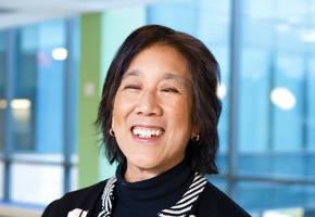 Headshot of Christine A. Poon wearing a black shirt
